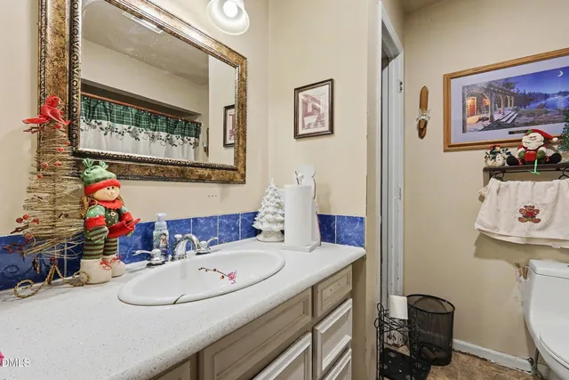 a bathroom with a shower and a toilet