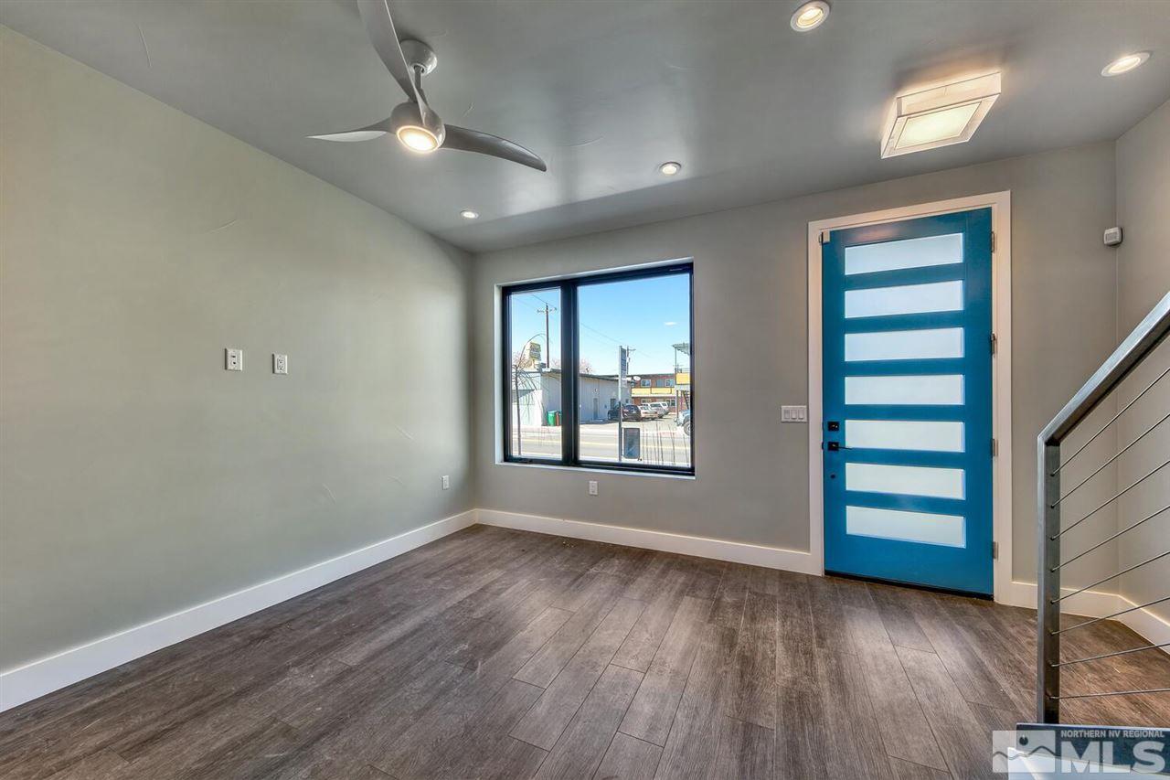 508 Mill Street Reno, NV 89502 - Photo 3 of 21 wooden floor in an empty room with a window