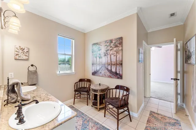 a work room with furniture and windows