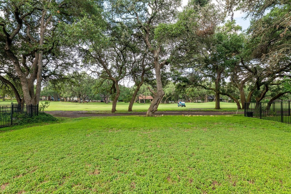 12 Wilson Circle Wimberley, TX 78676 - Photo 1 of 1 a huge green field with lots of trees
