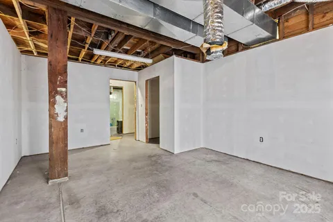 a kitchen with a stove and a table
