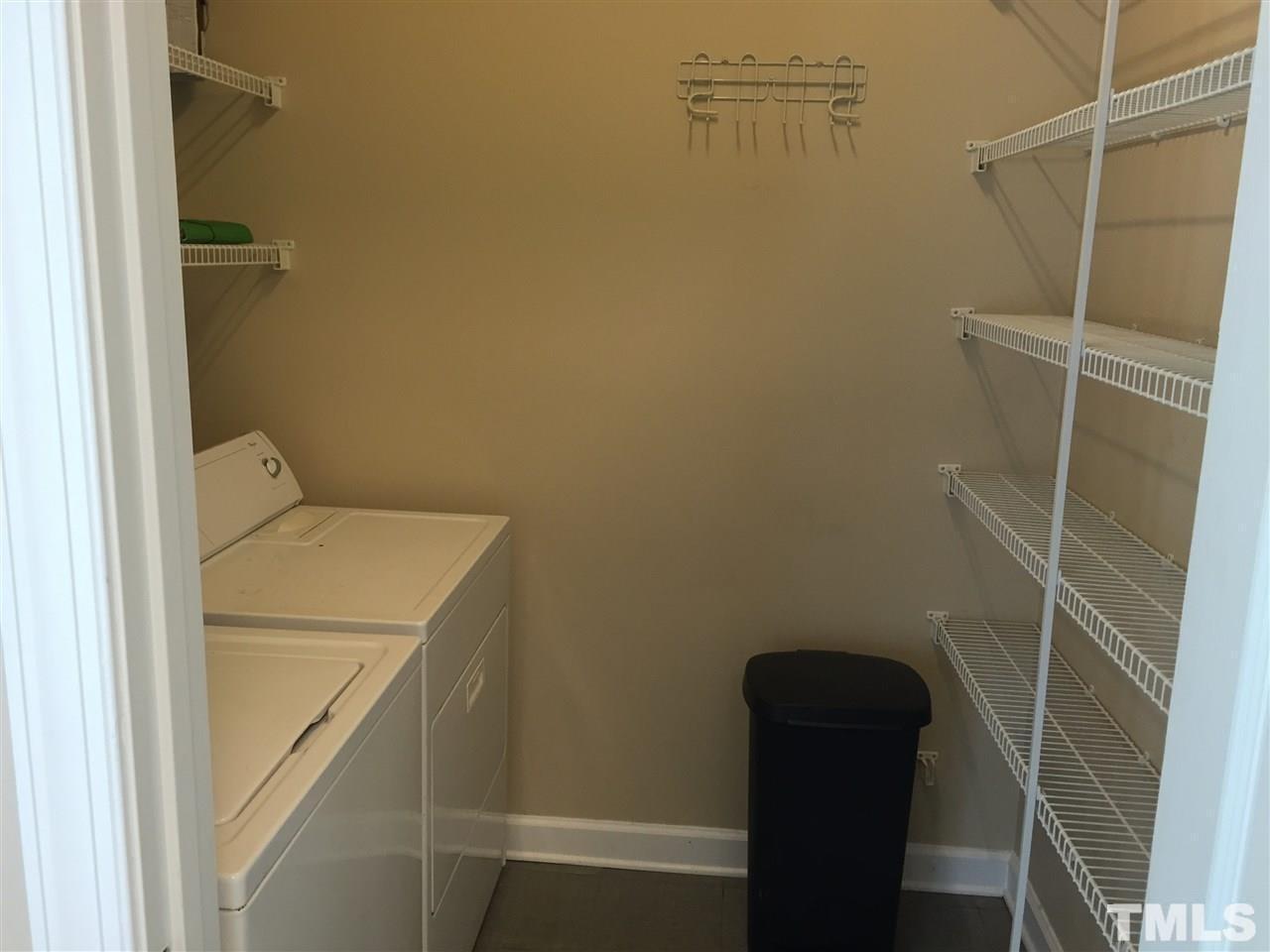 8605 London Park Court Raleigh, NC 27615 - Photo 11 of 18 a bathroom with a sink and toilet