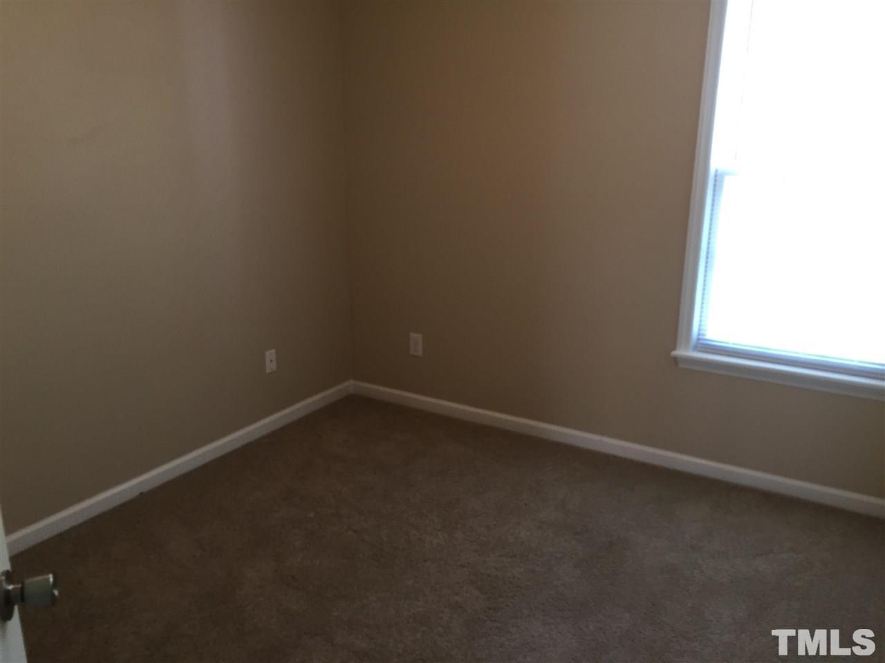 8605 London Park Court Raleigh, NC 27615 - Photo 16 of 18 an empty room with a window
