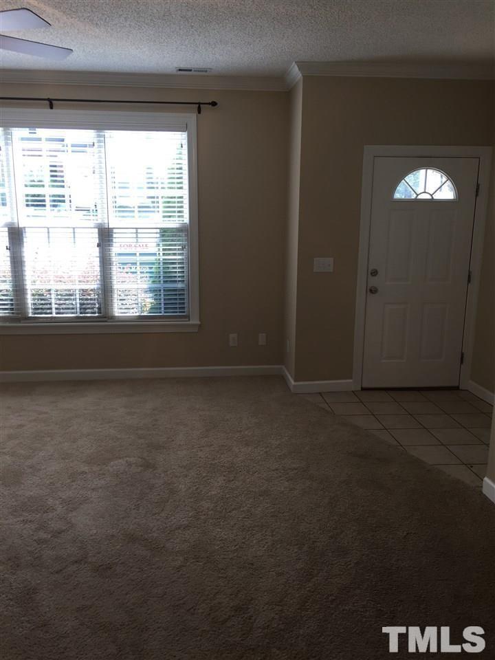8605 London Park Court Raleigh, NC 27615 - Photo 6 of 18 a view of an empty room with a window
