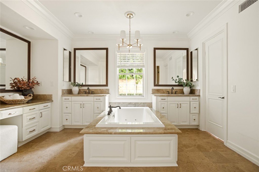 3 Kent Court Ladera Ranch, CA 92694 - Photo 23 of 68 Primary Bath with Jacuzzi Tub, Walk-In Shower, His and Her vanities, and an expansive makeup counter.