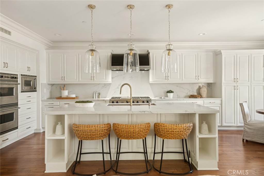 3 Kent Court Ladera Ranch, CA 92694 - Photo 6 of 68 Macaubas Quartz Countertops with Full Backsplash.