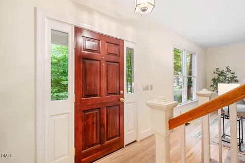 a view of front door with a potted plant
