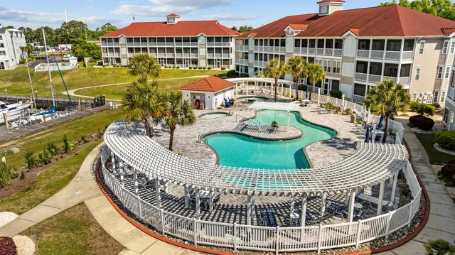 $379,000 | 4210 Coquina Harbour Drive, Unit A18, Little River, SC 29566