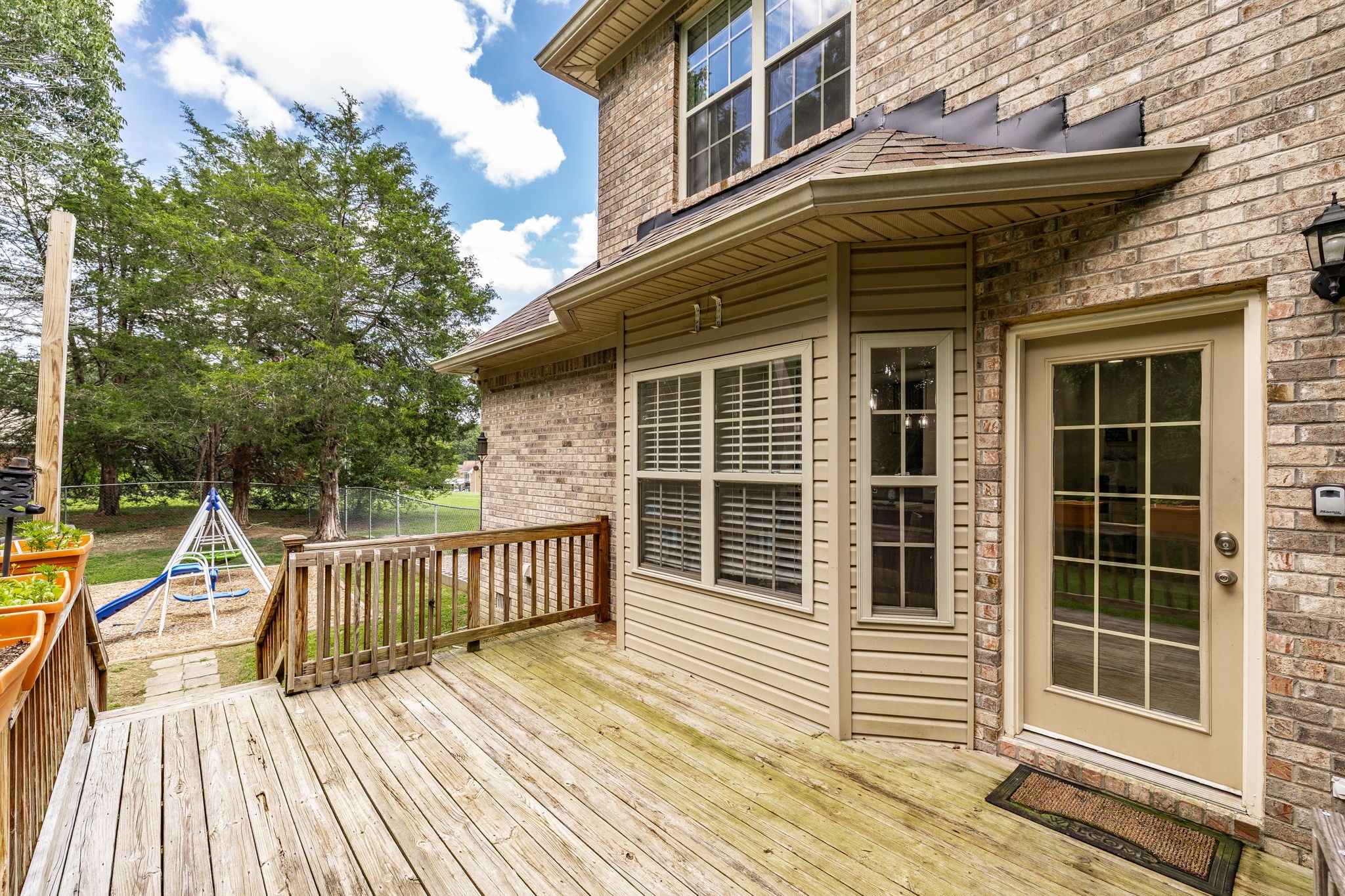 2860 Morgan Road Joelton, TN 37080 - Photo 37 of 45 a view of a roof deck with couches and wooden floor