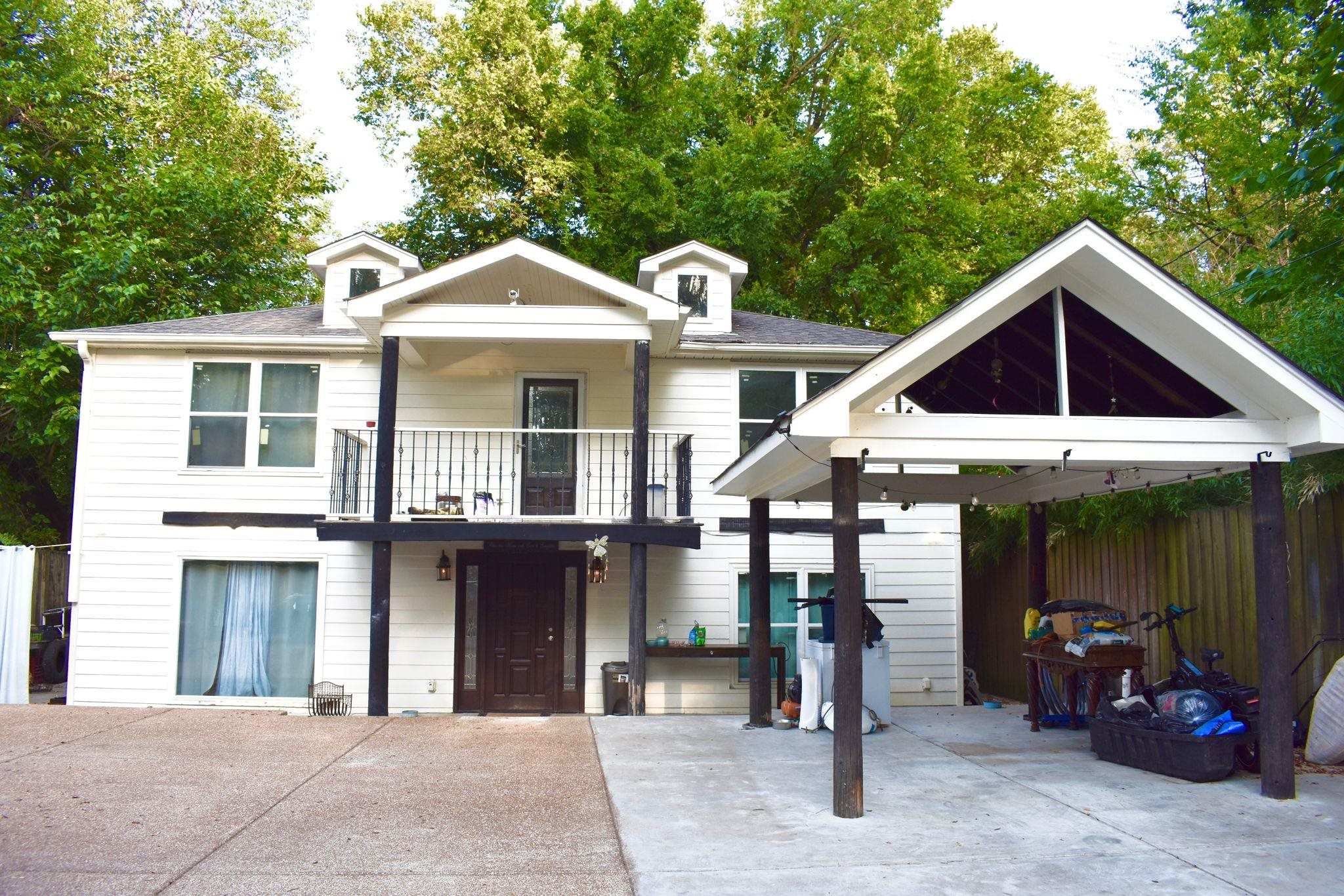 a front view of a house with porch
