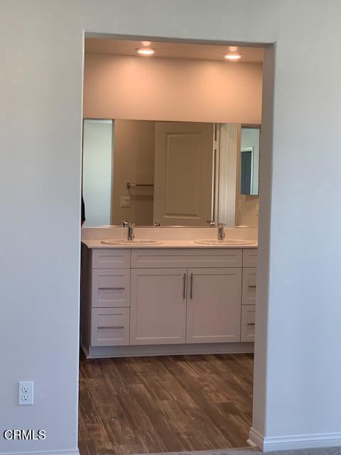 312 Dominguez Street Camarillo, CA 93010 - Photo 11 of 25 a bathroom with a sink and a mirror