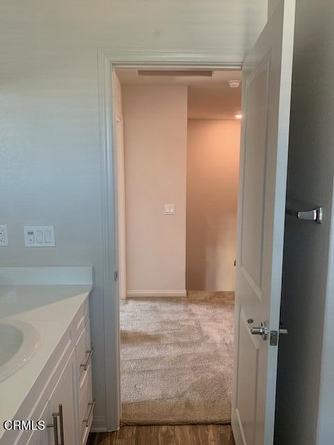 312 Dominguez Street Camarillo, CA 93010 - Photo 16 of 25 a bathroom with a sink and a mirror