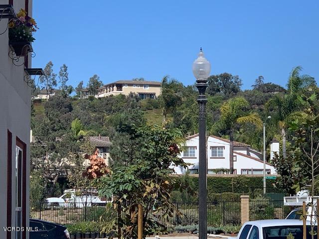 312 Dominguez Street Camarillo, CA 93010 - Photo 25 of 25 a front view of a house with a yard and fountain in middle