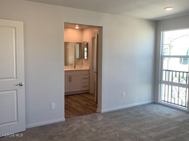 312 Dominguez Street Camarillo, CA 93010 - Photo 9 of 25 an empty room with windows and closet