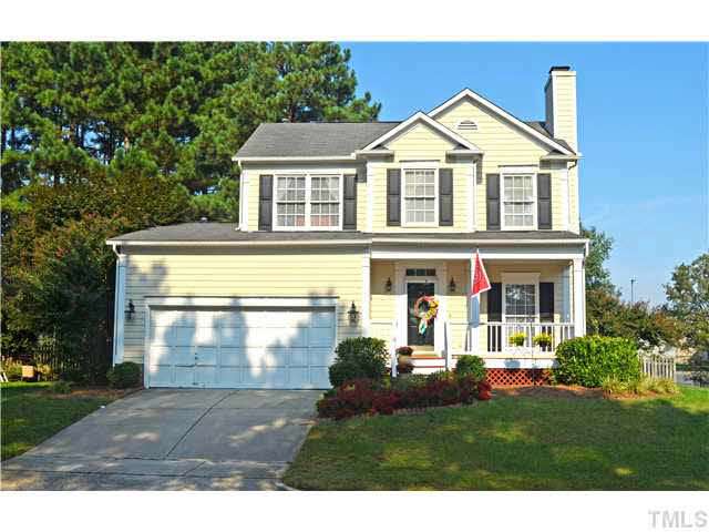 7617 Overland Trail Raleigh, NC 27615 - Photo 1 of 25 a front view of a house with a yard