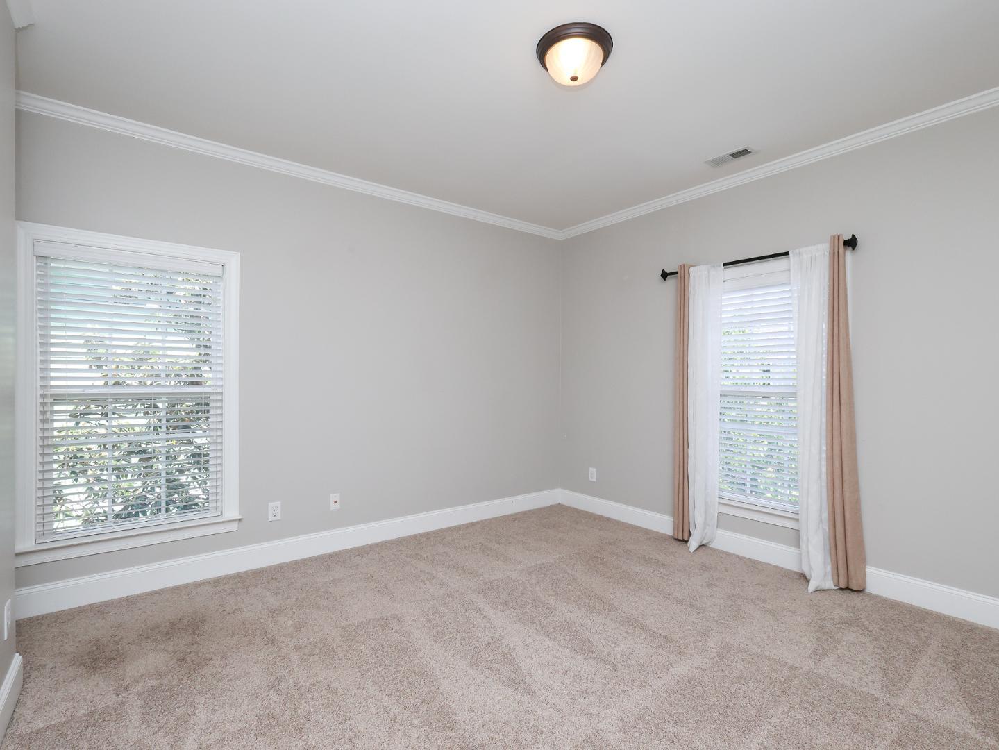 1155 Harp Street Raleigh, NC 27604 - Photo 26 of 33 an empty room with windows