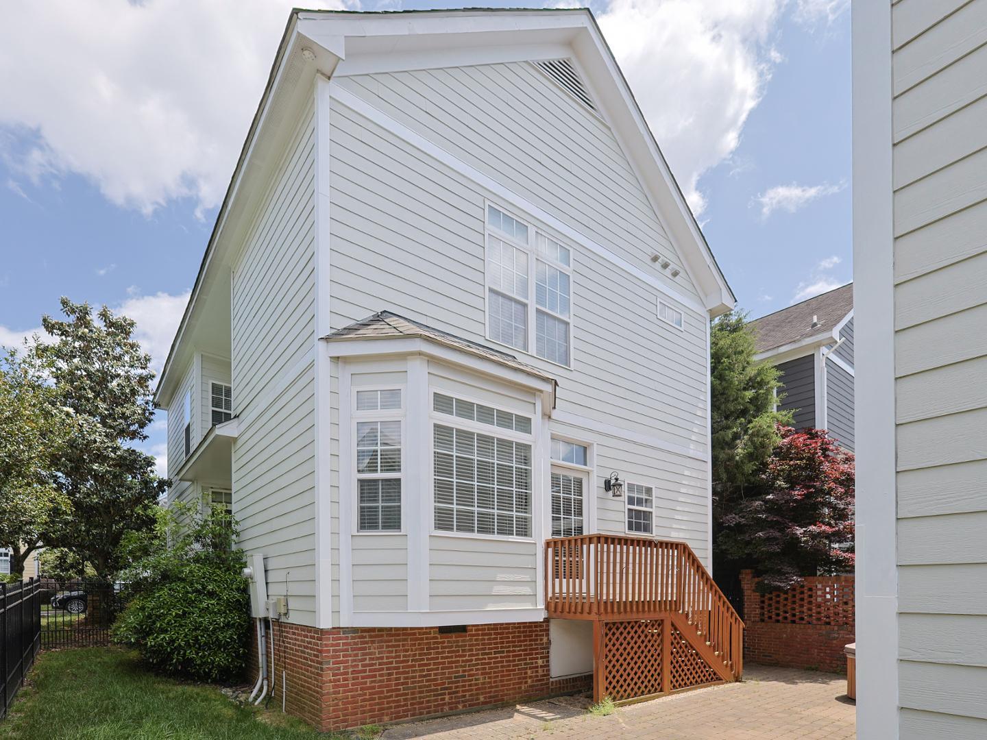 1155 Harp Street Raleigh, NC 27604 - Photo 31 of 33 a front view of a house with a garden