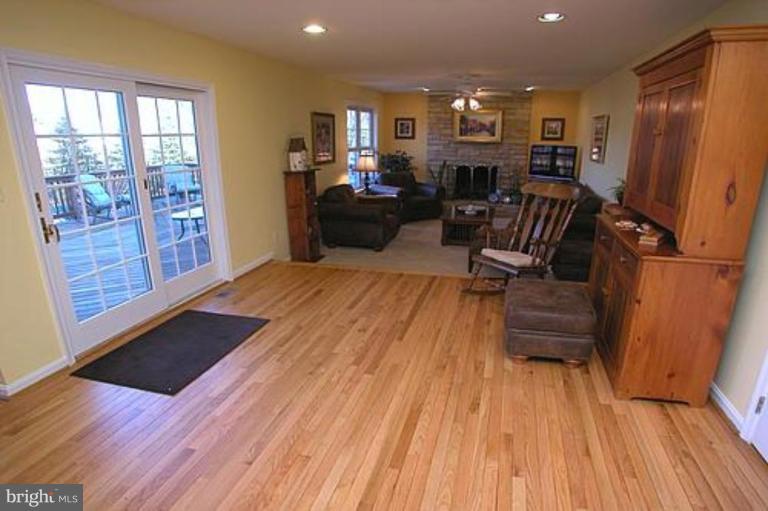 9986 Old Frederick Road Ellicott City, MD 21042 - Photo 3 of 30 a living room with furniture and wooden floor