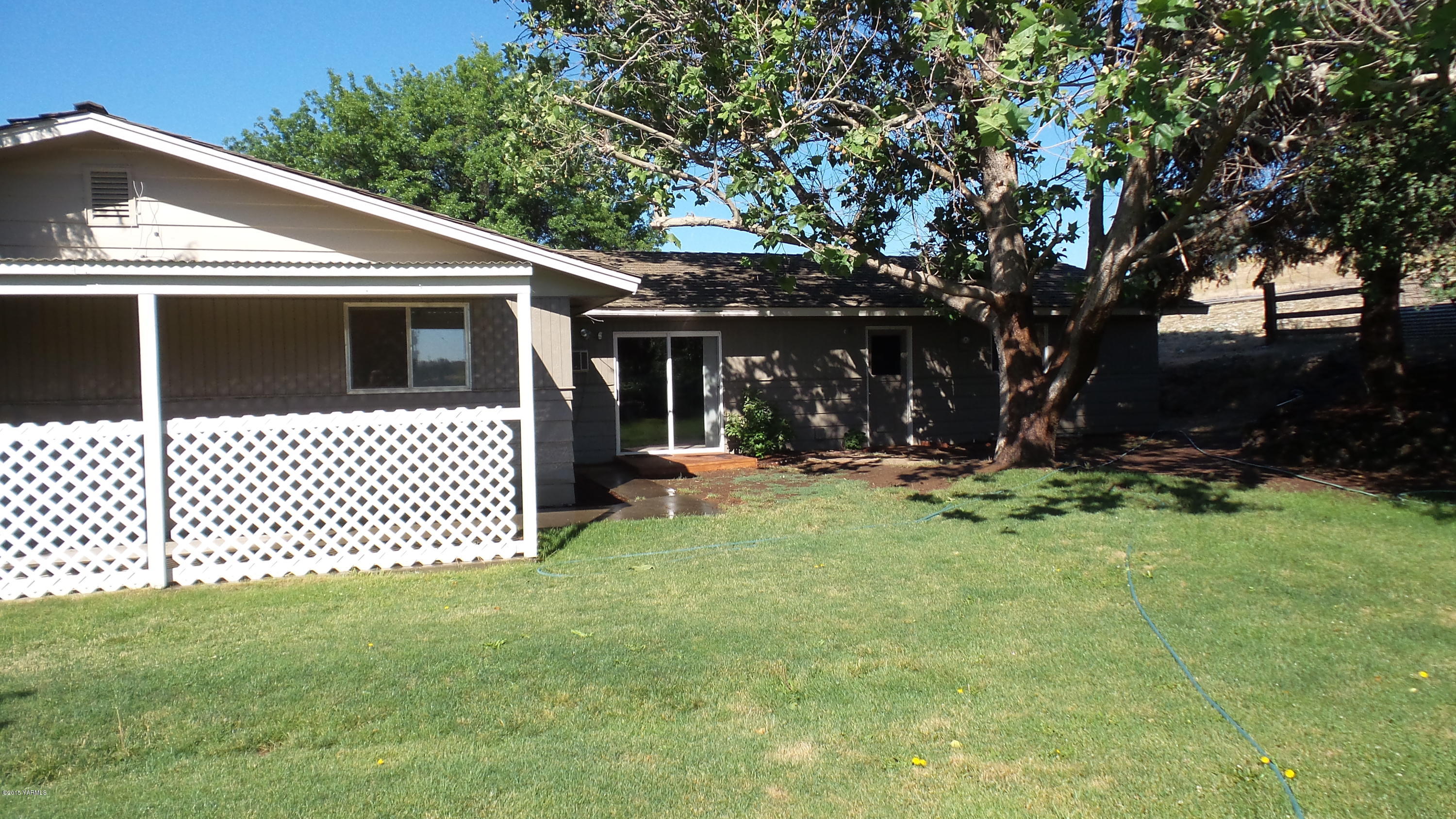 71 West Canyon Road Yakima, WA 98908 - Photo 3 of 19 a view of a house with a yard
