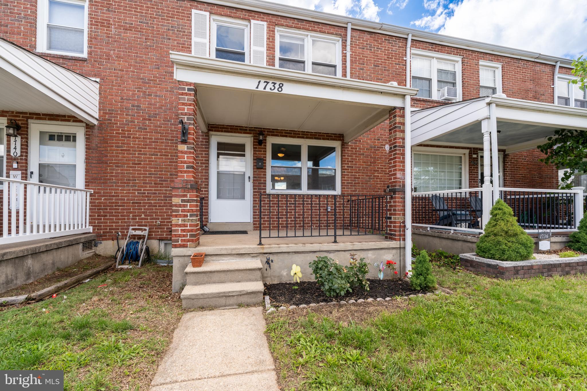 1738 Stokesley Road Baltimore, MD 21222 - Photo 1 of 34 a front view of a house with garden