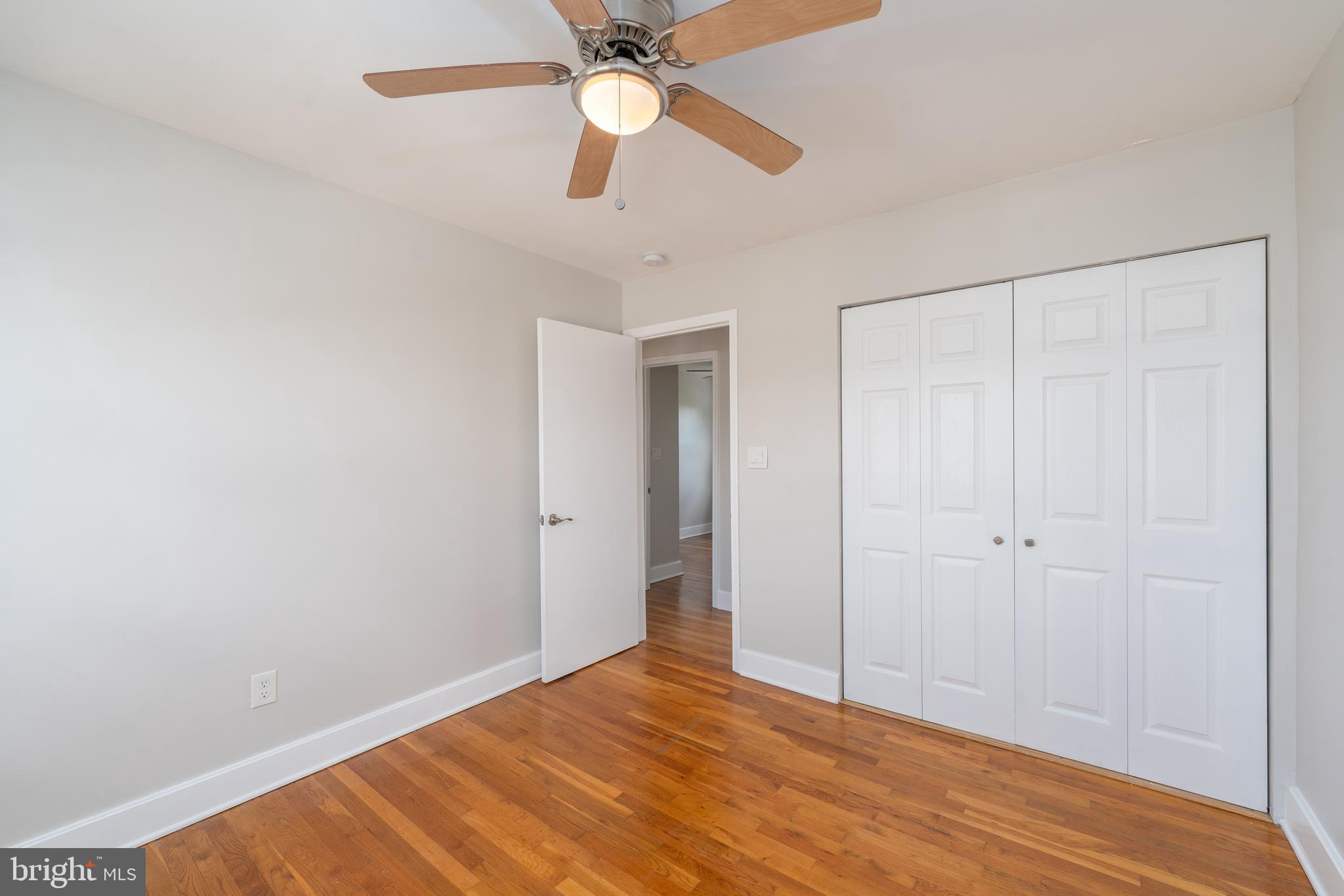 1738 Stokesley Road Baltimore, MD 21222 - Photo 12 of 34 a view of empty room with wooden floor