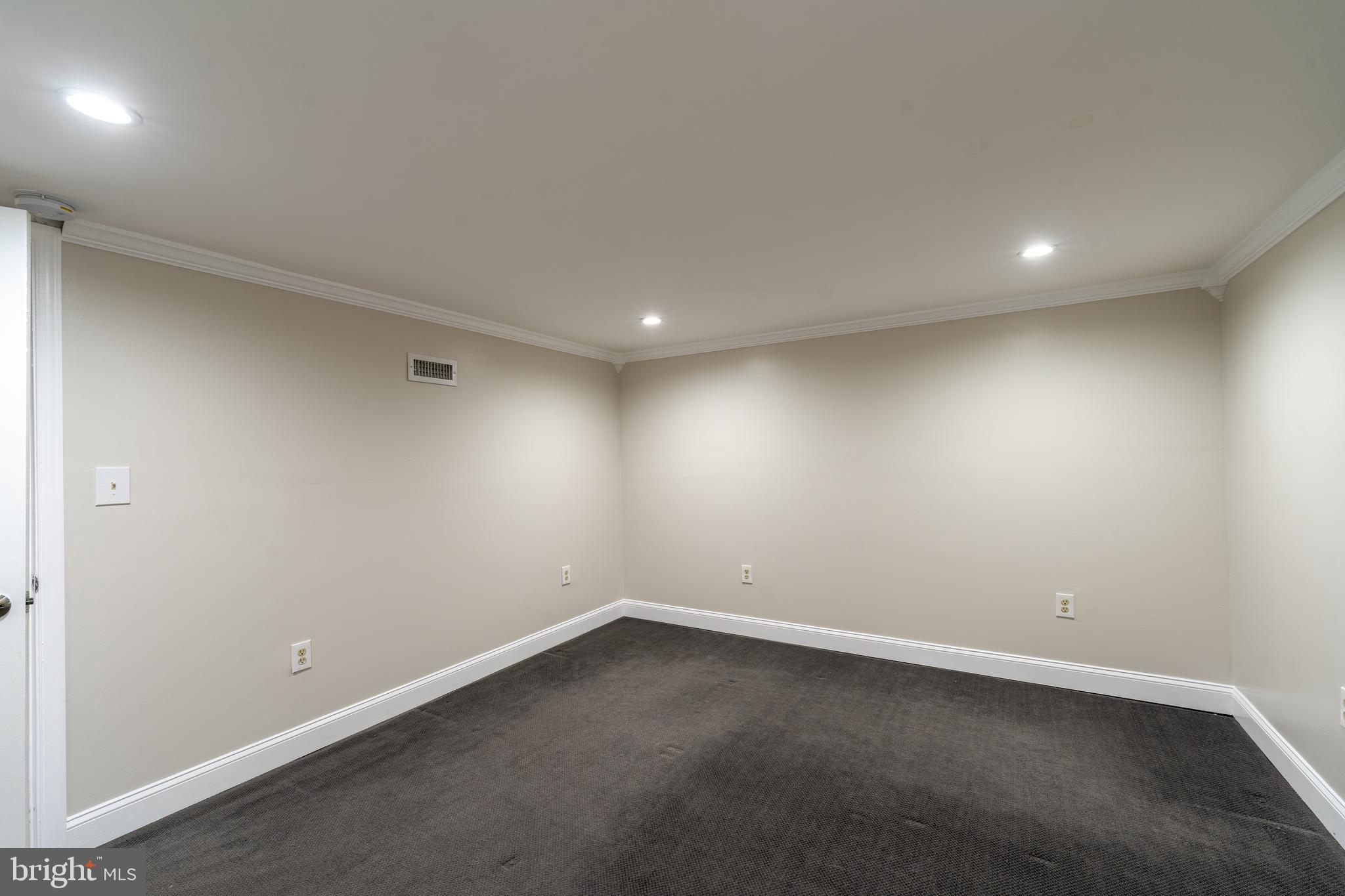 1738 Stokesley Road Baltimore, MD 21222 - Photo 23 of 34 an empty room with a empty space and window