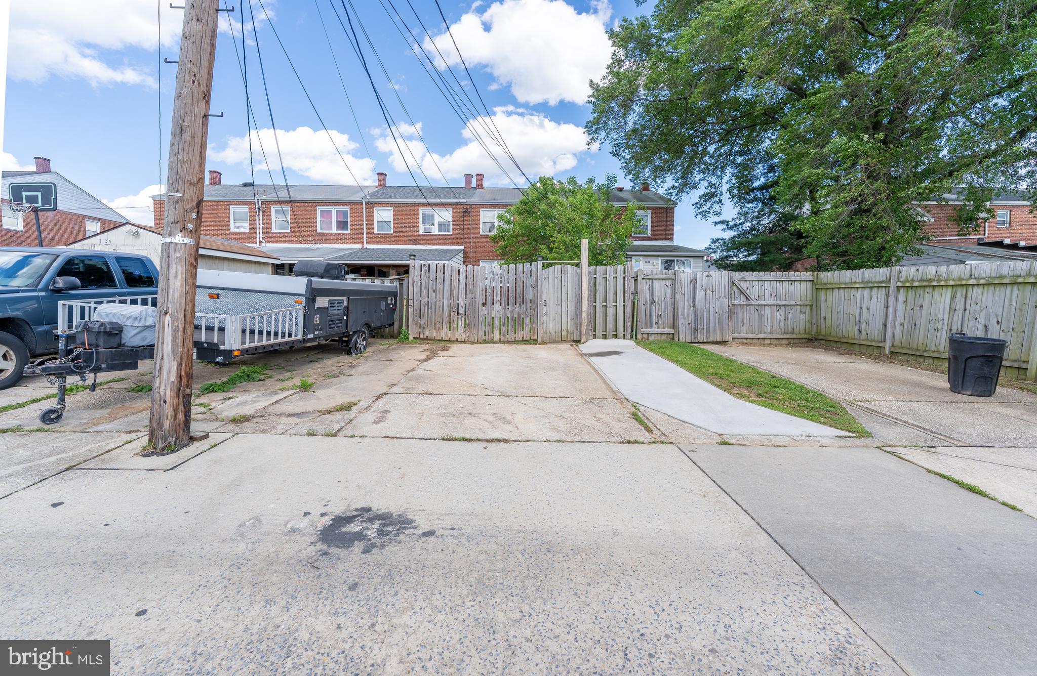 1738 Stokesley Road Baltimore, MD 21222 - Photo 30 of 34 a view of a backyard with a patio