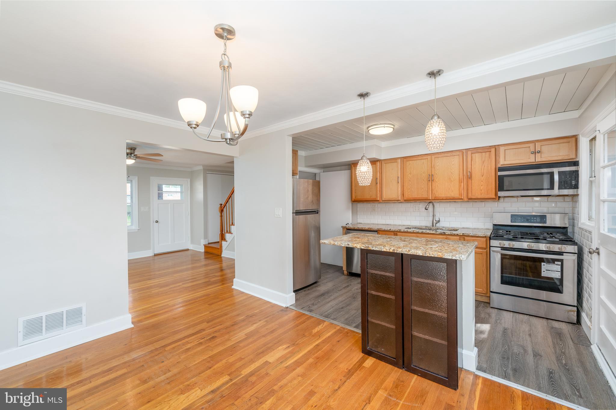 1738 Stokesley Road Baltimore, MD 21222 - Photo 8 of 34 a kitchen with stainless steel appliances granite countertop a stove and cabinets