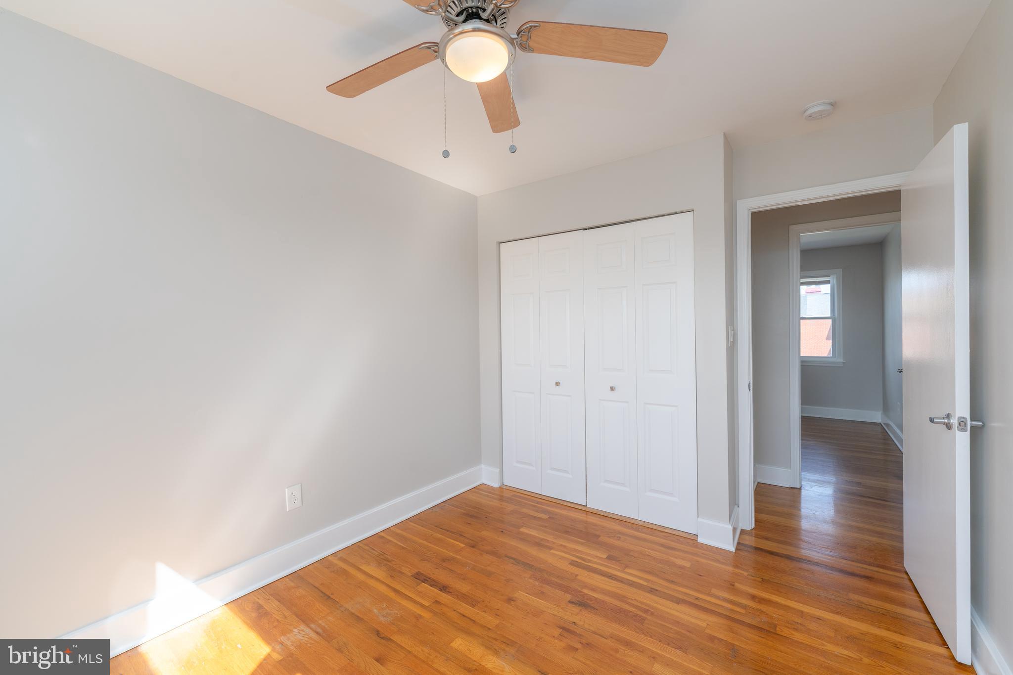 1738 Stokesley Road Baltimore, MD 21222 - Photo 10 of 34 a view of empty room with wooden floor