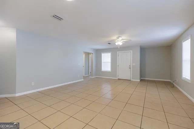 an empty room with windows