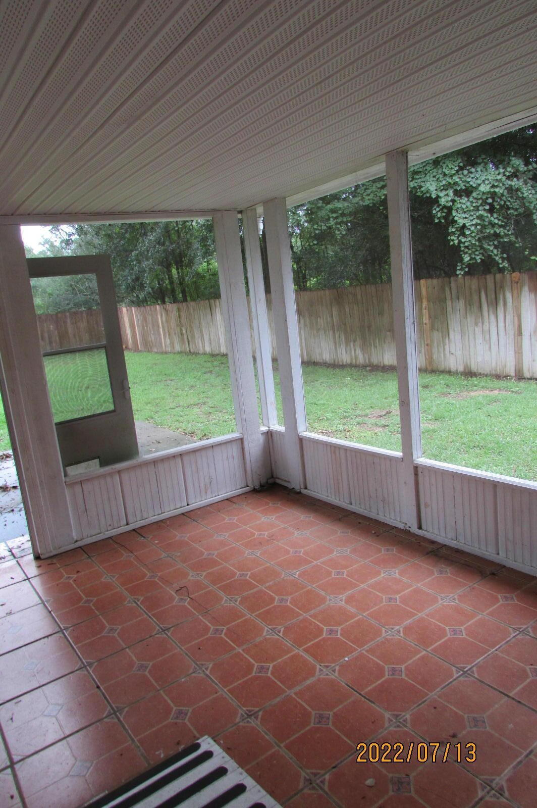 6444 Kylito Circle Crestview, FL 32539 - Photo 21 of 23 a view of a garden from a patio