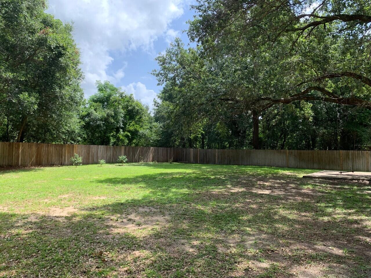6444 Kylito Circle Crestview, FL 32539 - Photo 22 of 23 a view of a backyard