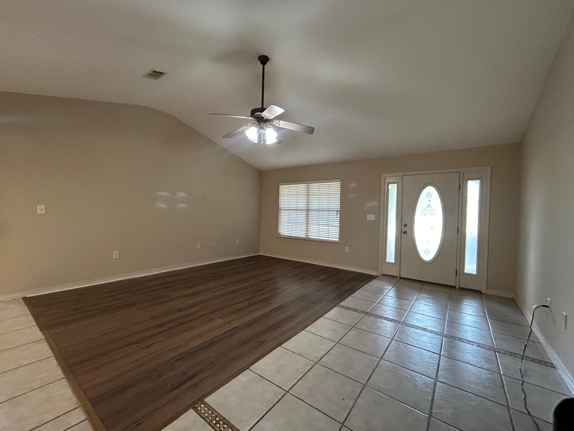 6444 Kylito Circle Crestview, FL 32539 - Photo 3 of 23 a view of an empty room with a window
