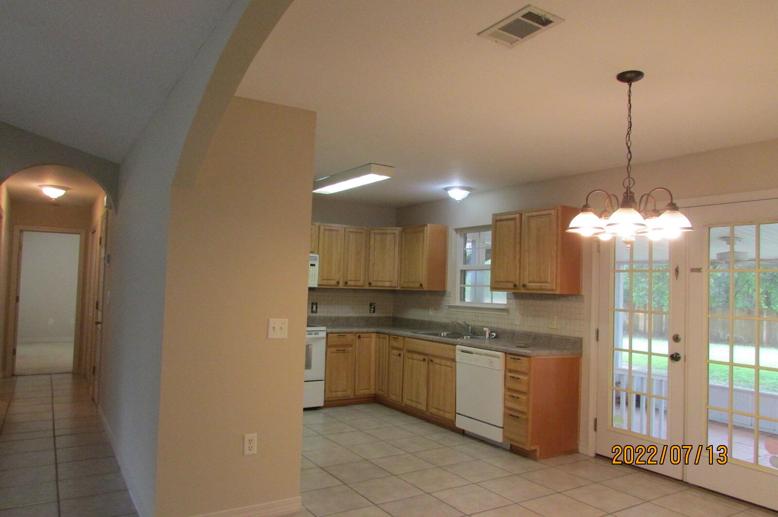 6444 Kylito Circle Crestview, FL 32539 - Photo 6 of 23 a kitchen with a sink cabinets and window