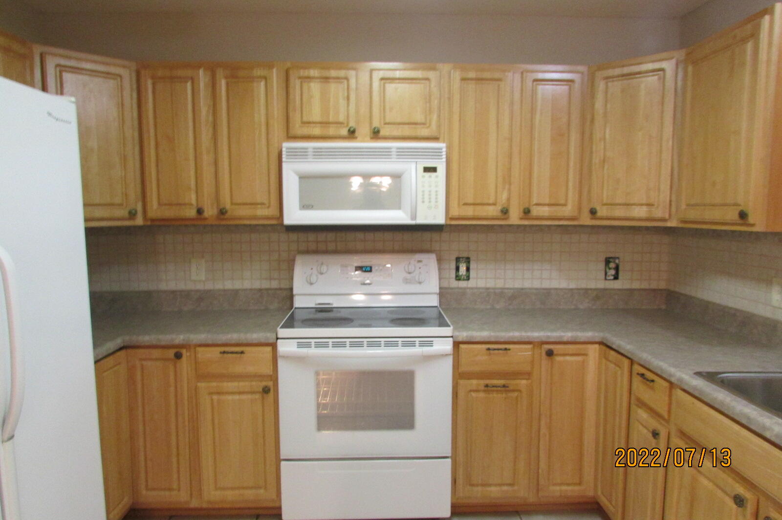6444 Kylito Circle Crestview, FL 32539 - Photo 7 of 23 a kitchen with granite countertop cabinets stainless steel appliances and a sink