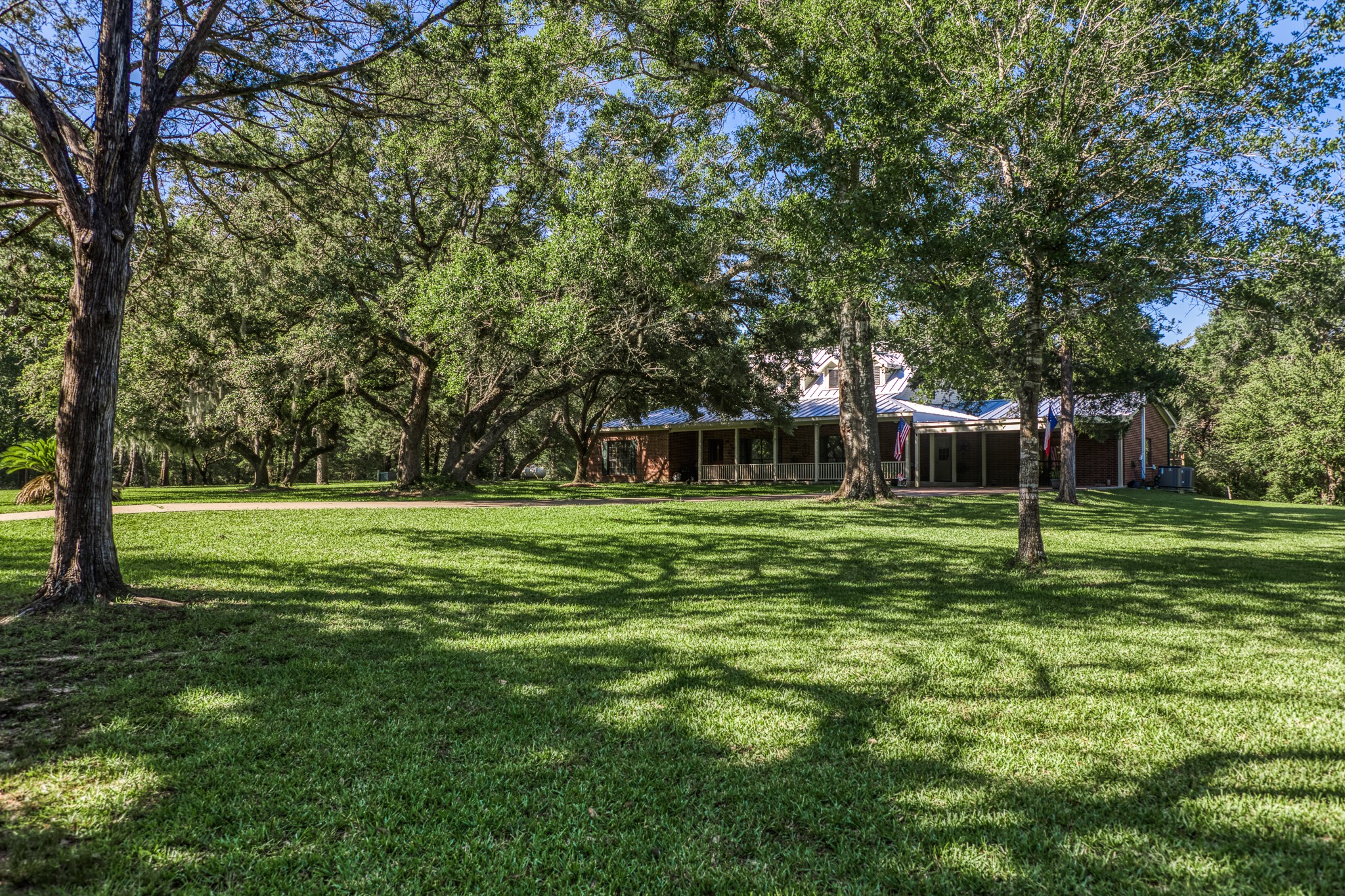 1017 Allen Road Cat Spring, TX 78933 - Photo 4 of 47 a view of a park with large trees