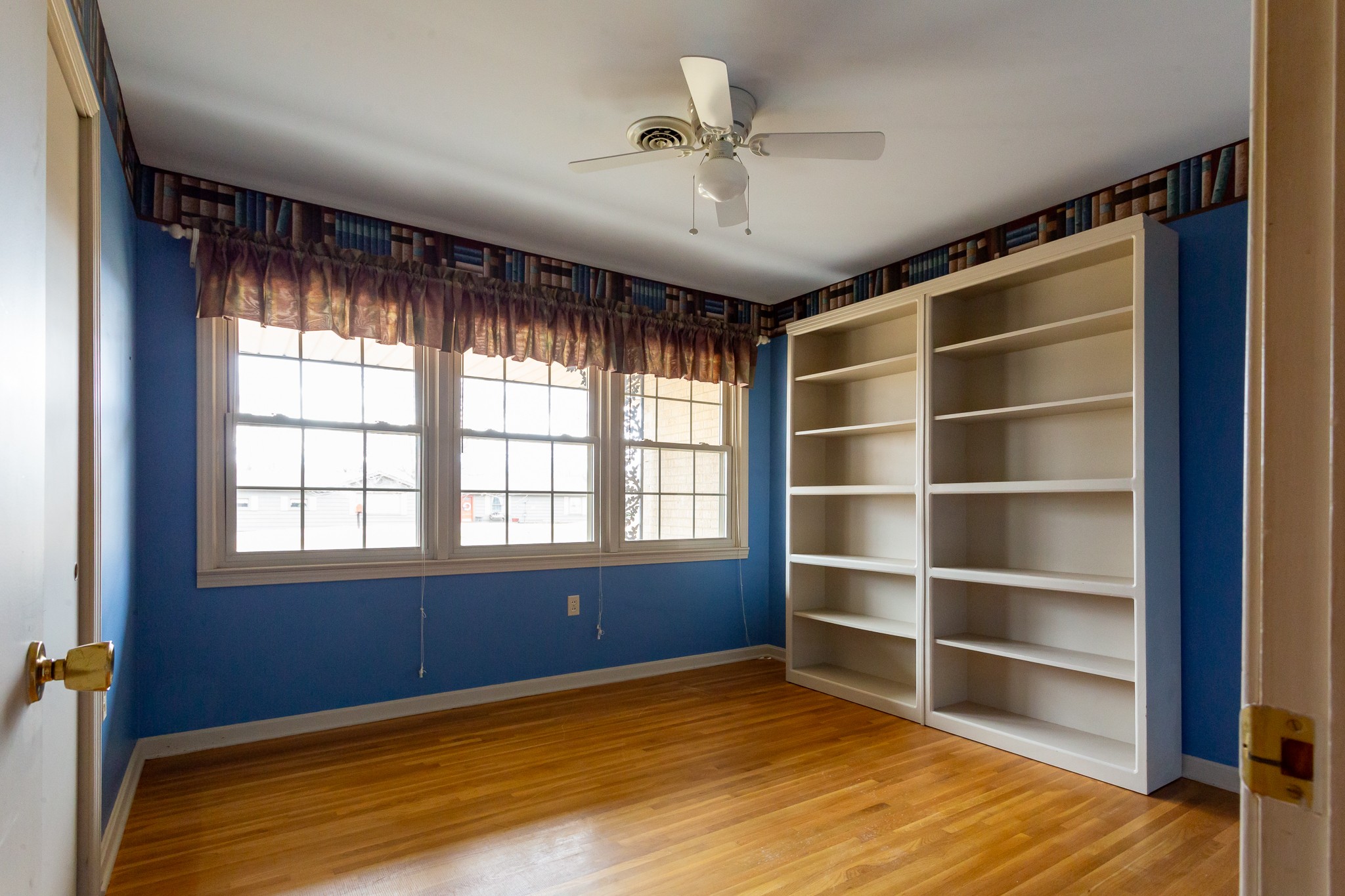 133 Byrd Road Dover, TN 37058 - Photo 11 of 35 a view of an empty room with a window and wooden floor