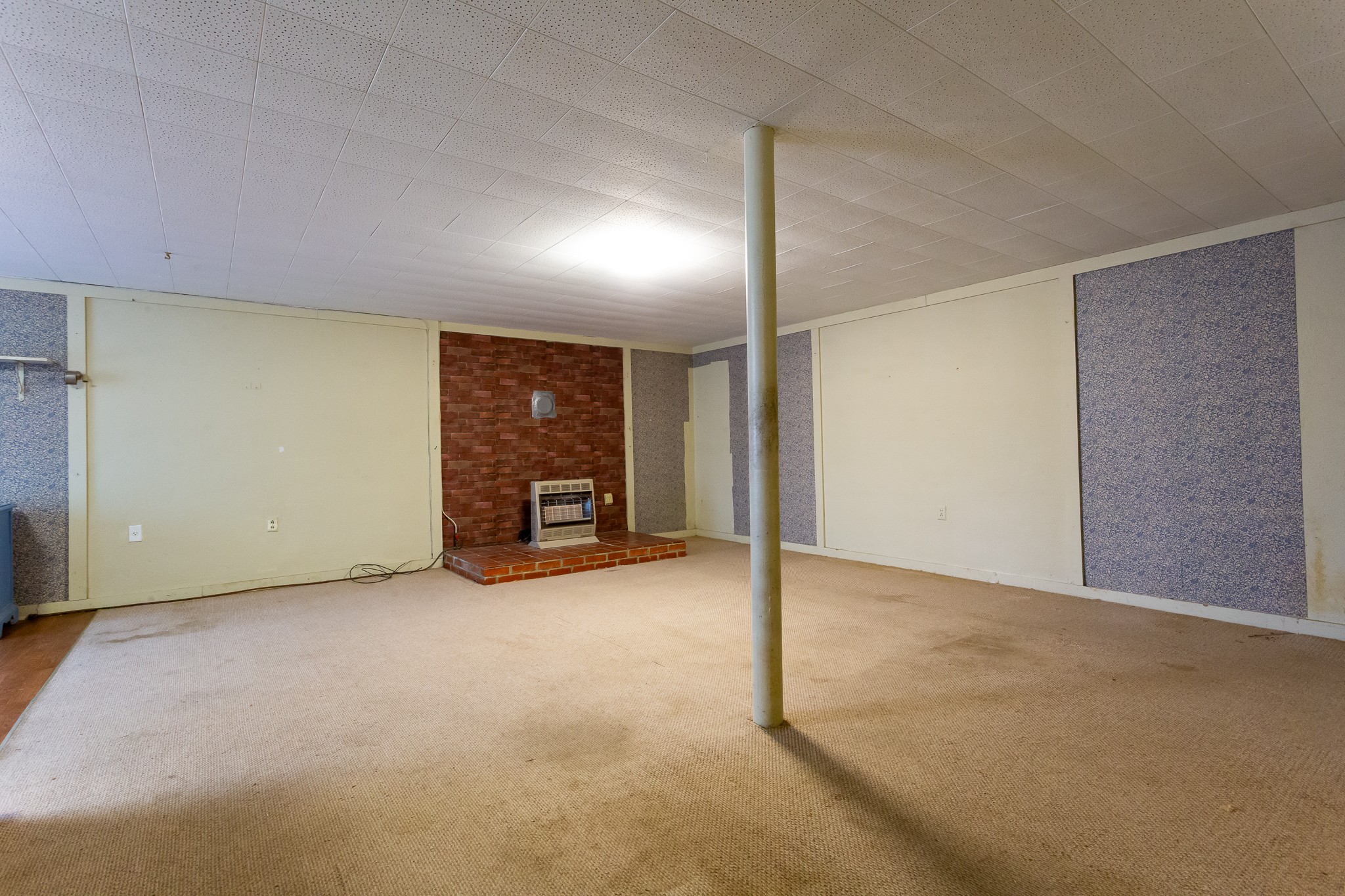 133 Byrd Road Dover, TN 37058 - Photo 14 of 35 a view of an empty room with a fireplace