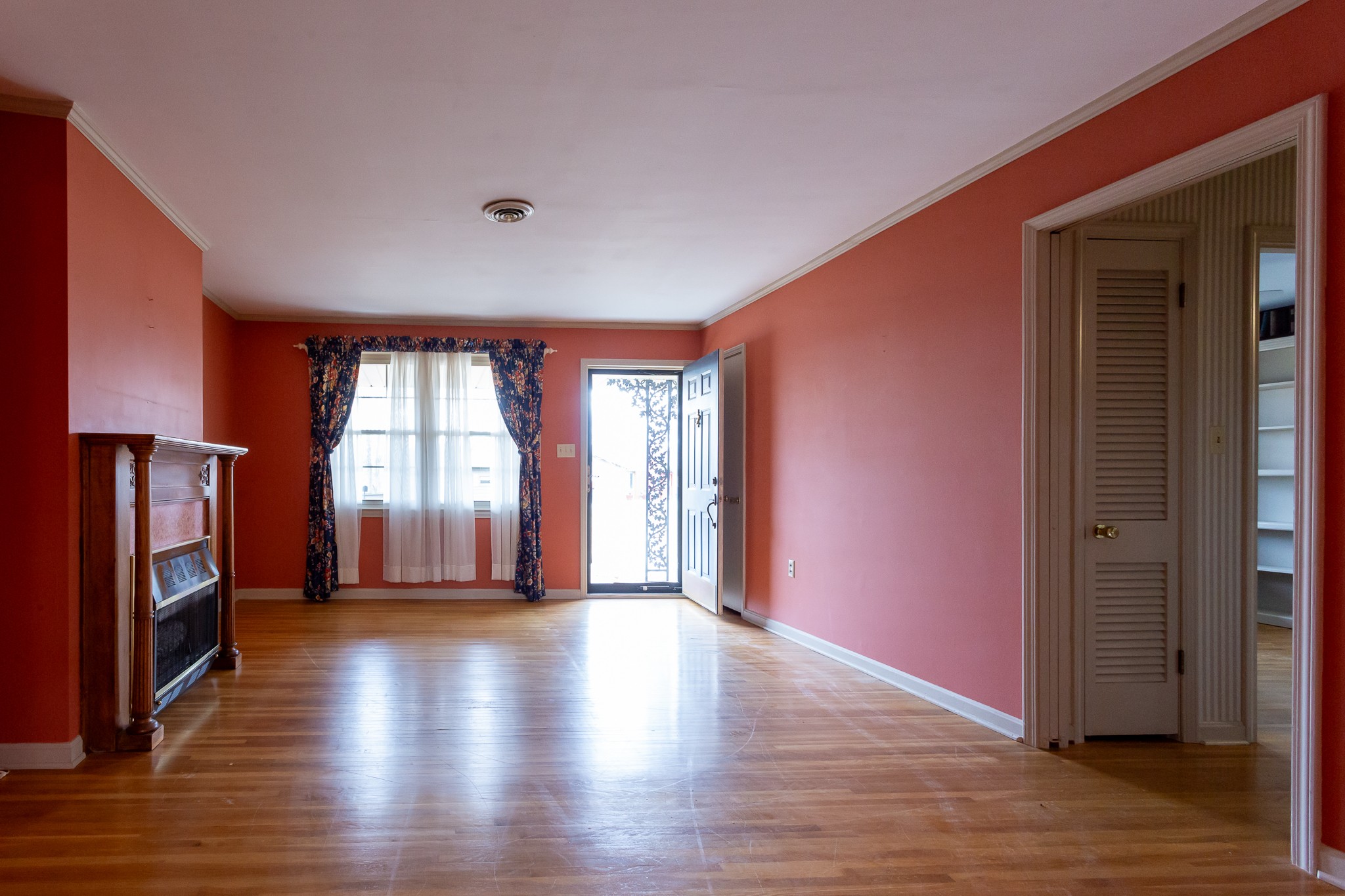 133 Byrd Road Dover, TN 37058 - Photo 2 of 35 a view of an empty room with a window and wooden floor