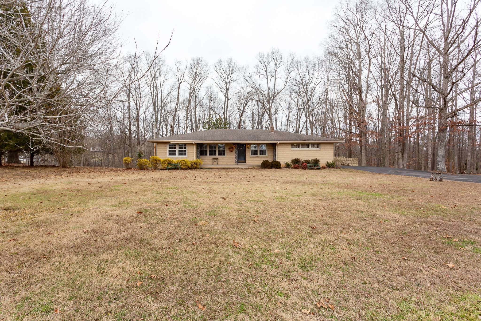 133 Byrd Road Dover, TN 37058 - Photo 22 of 35 a view of a house with snow on the side of the road