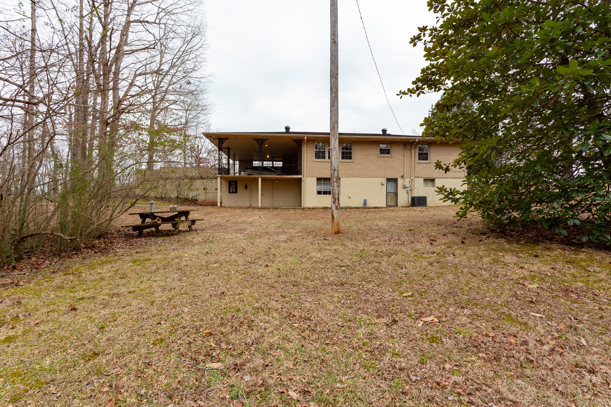 133 Byrd Road Dover, TN 37058 - Photo 28 of 35 a view of a house with a backyard