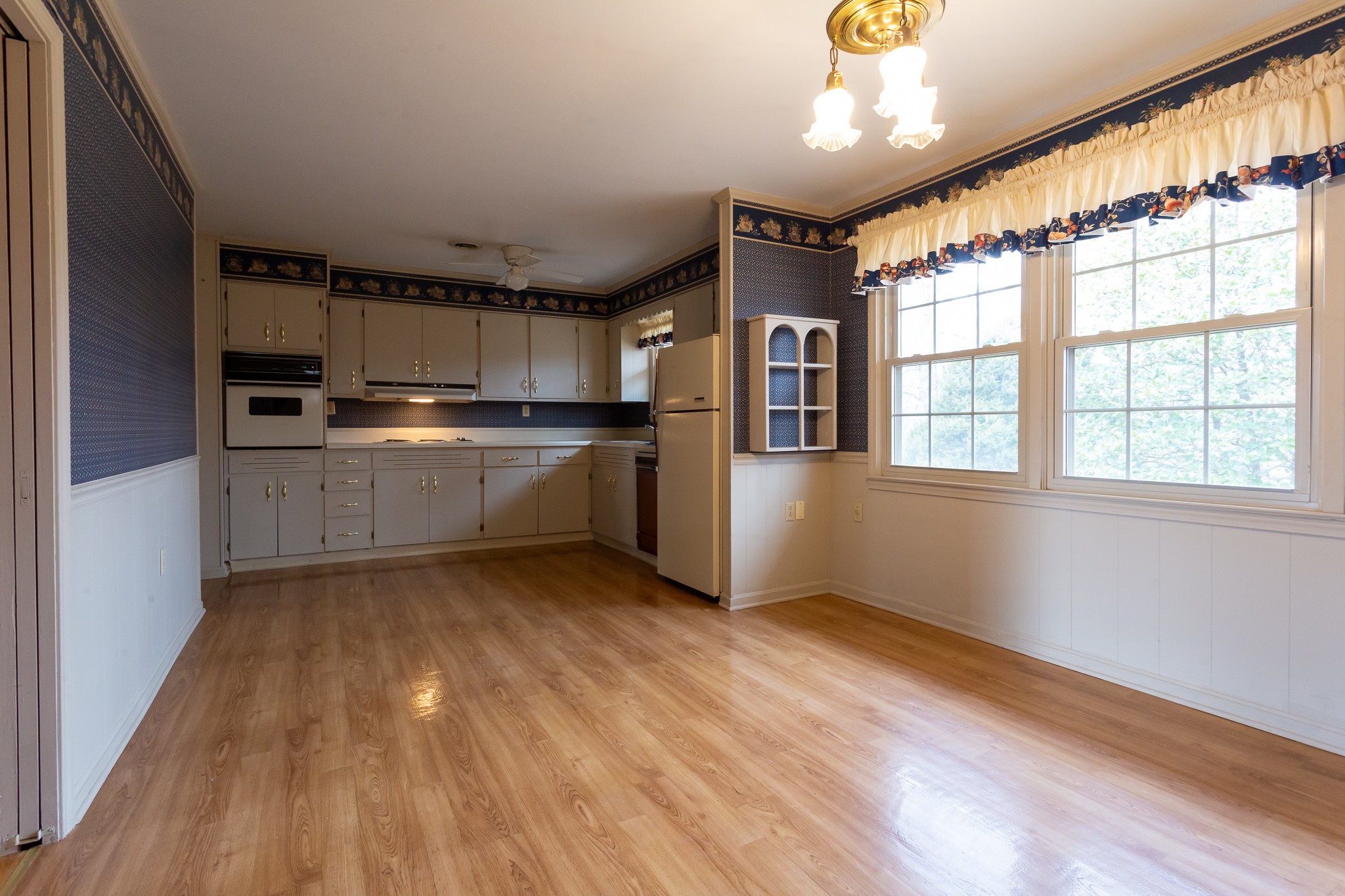 133 Byrd Road Dover, TN 37058 - Photo 5 of 35 a kitchen with stainless steel appliances granite countertop a stove and a refrigerator