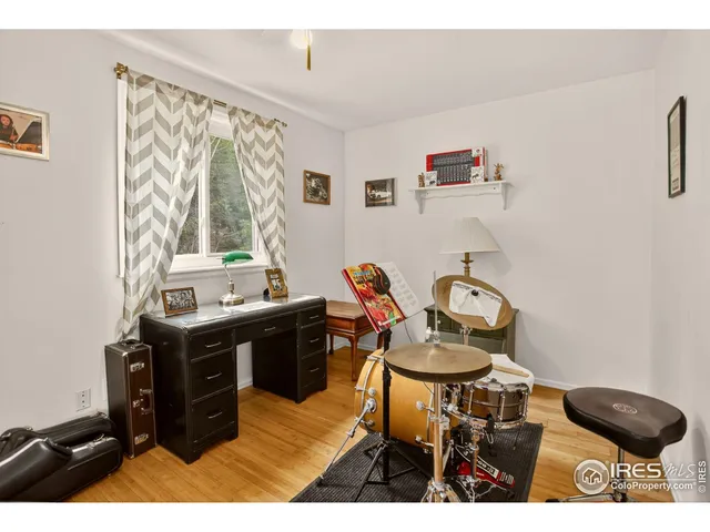 a room with a window and a chair