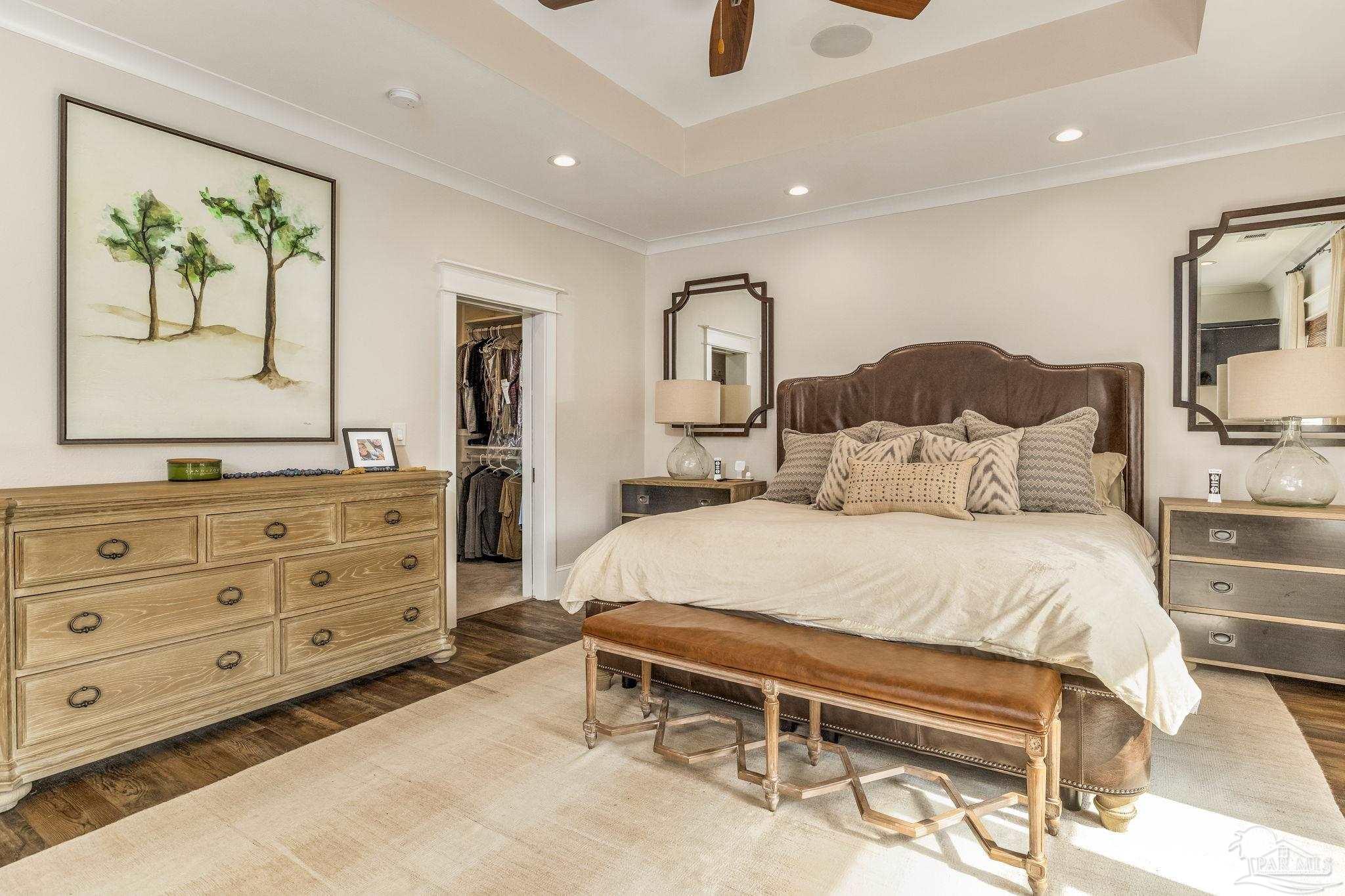 9050 Salter Road Pace, FL 32571 - Photo 15 of 66 a bedroom with a bed and a dresser