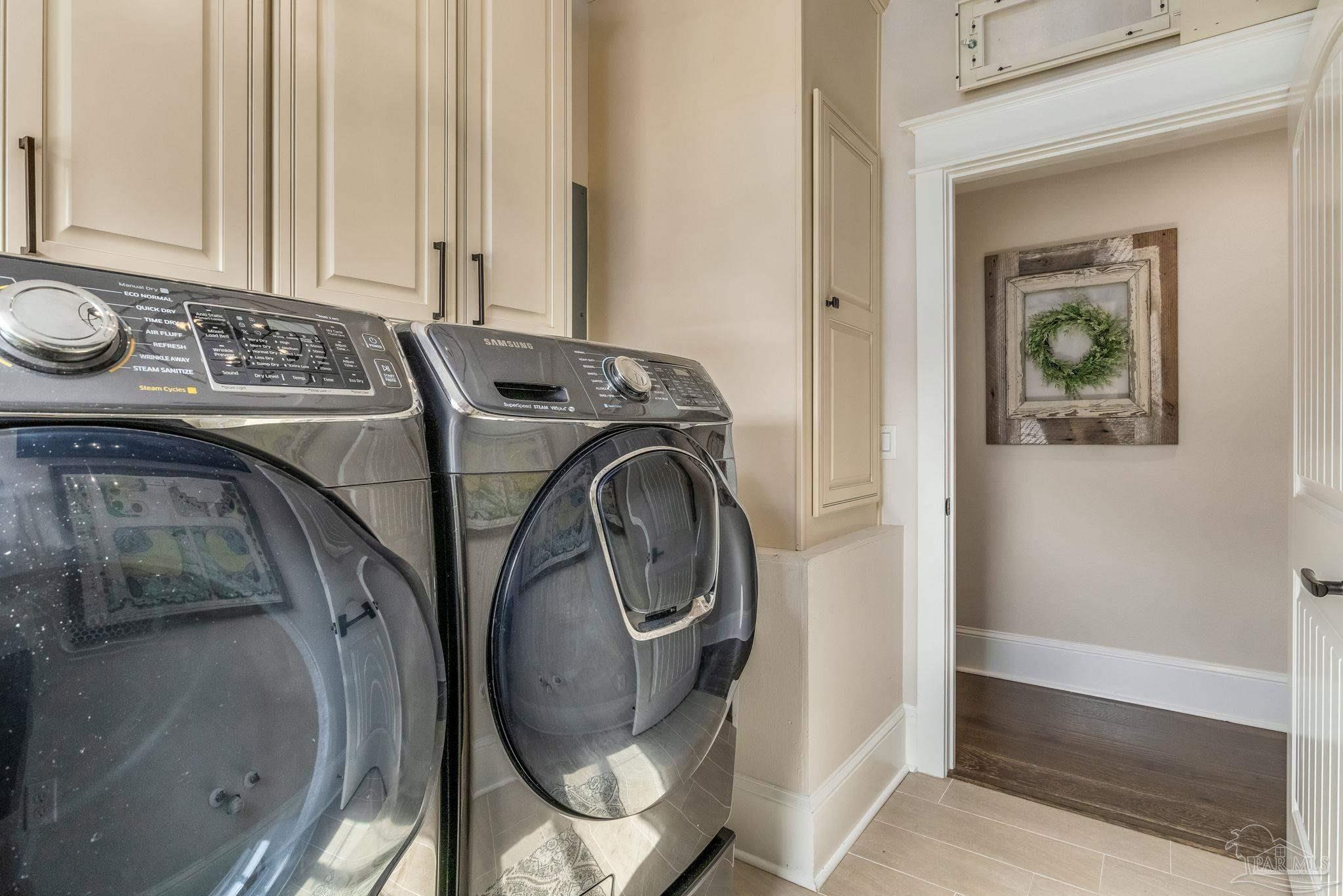 9050 Salter Road Pace, FL 32571 - Photo 23 of 66 a view of washer and dryer