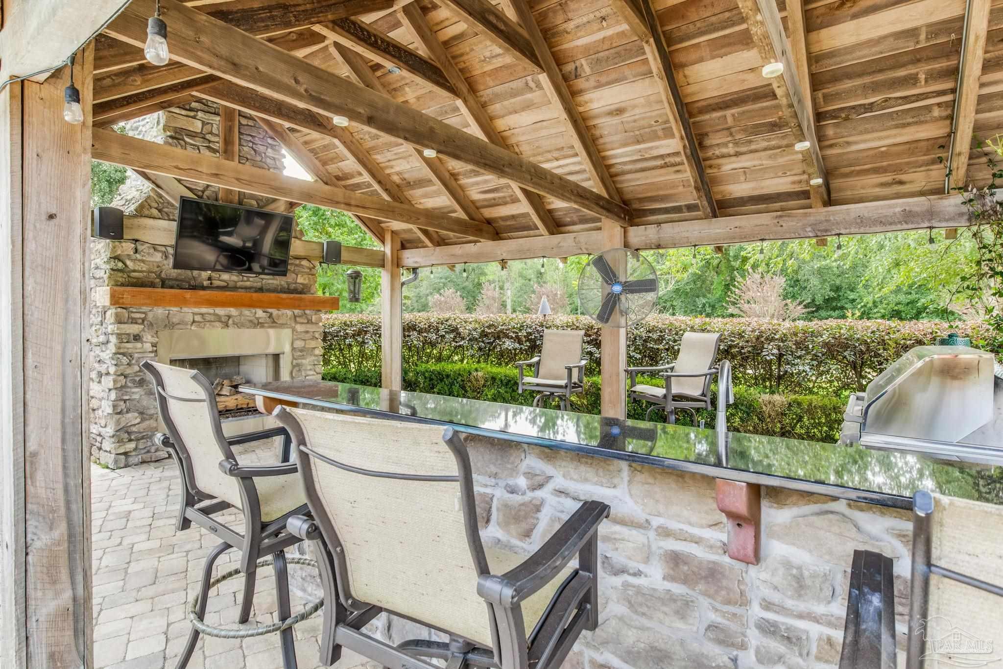 9050 Salter Road Pace, FL 32571 - Photo 36 of 66 a view of yard with patio