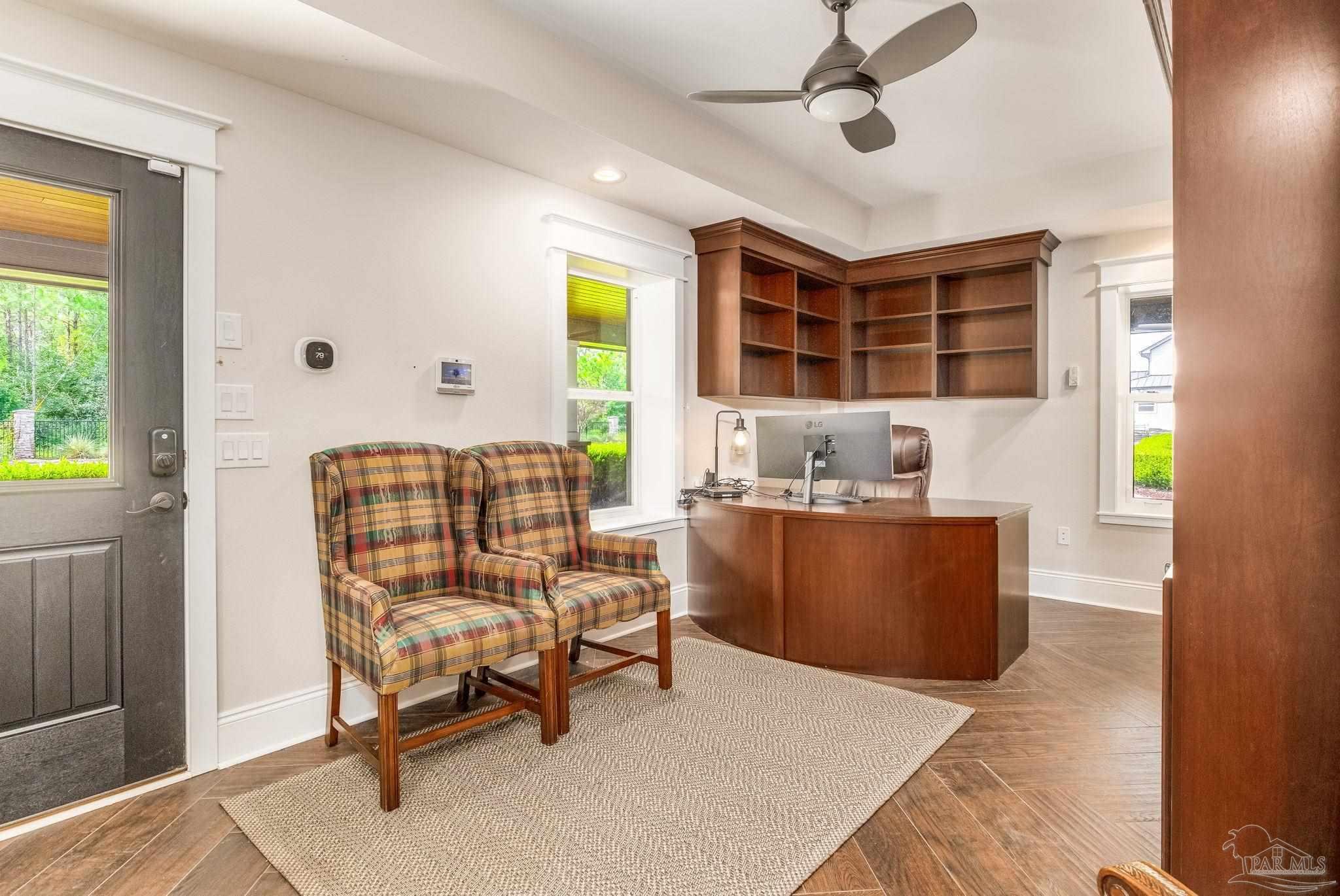 9050 Salter Road Pace, FL 32571 - Photo 53 of 66 a living room with furniture and a window
