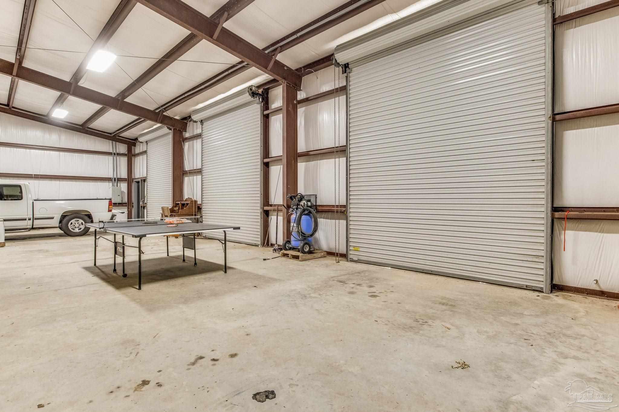 9050 Salter Road Pace, FL 32571 - Photo 58 of 66 a view of a livingroom with furniture and a gate