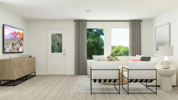 a living room with furniture and a window