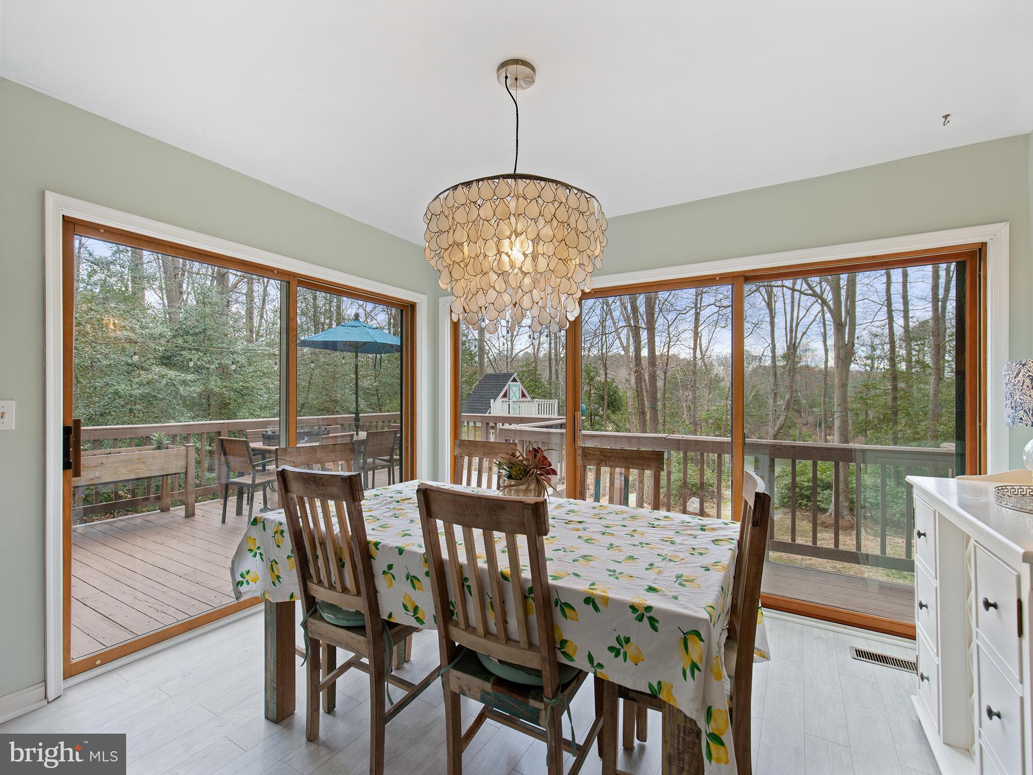 819 Big Road Lusby, MD 20657 - Photo 13 of 55 Dining with corner of glass